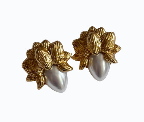 Nature-inspired earrings featuring textured gold-tone floral tops and elongated pearl-like teardrop centers; a striking blend of organic elegance and vintage charm, echoing the poetic romanticism of the Hopeless Romantic Society aesthetic